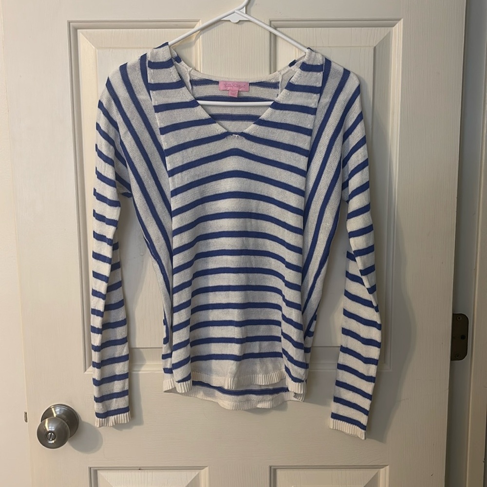 This is a lily Pulitzer top that’s can be worn as a shirt or cover up.